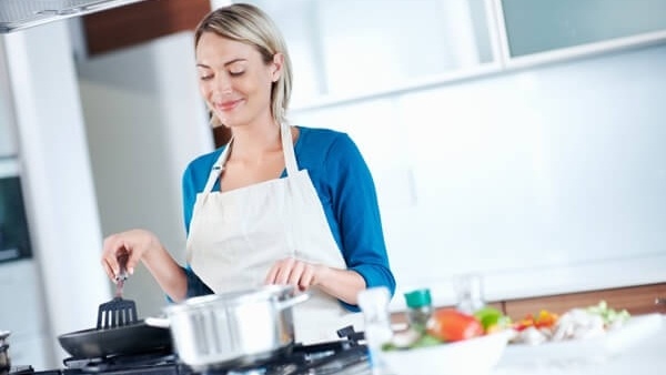 Woman cooking at home