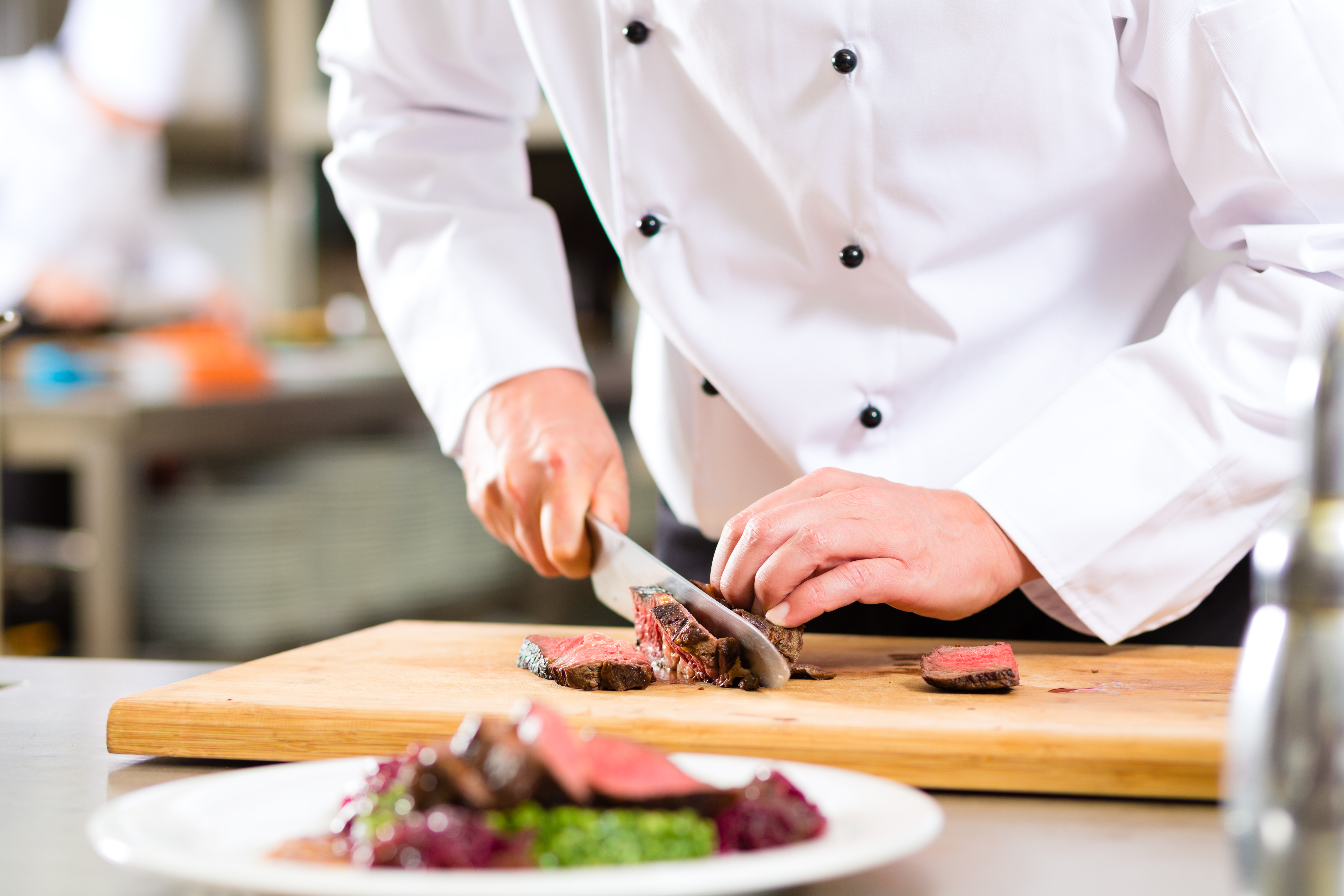Chef using cutting board