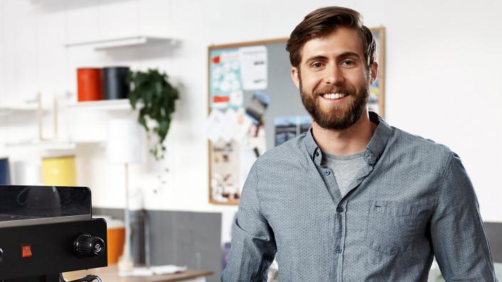 Restaurant worker smiling