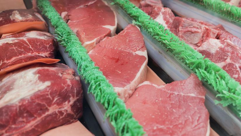 beef and veal products in a chilled grocery display