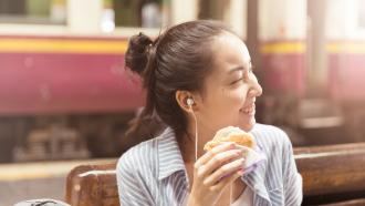 Girl eating at restaurant